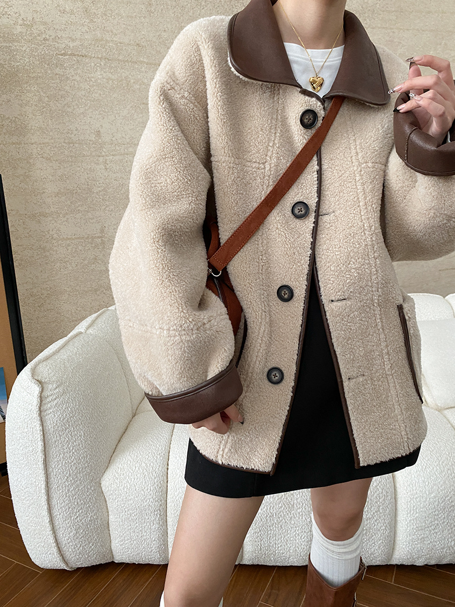 Winter women's casual solid color lapel long sleeved loose fur one-piece jacket