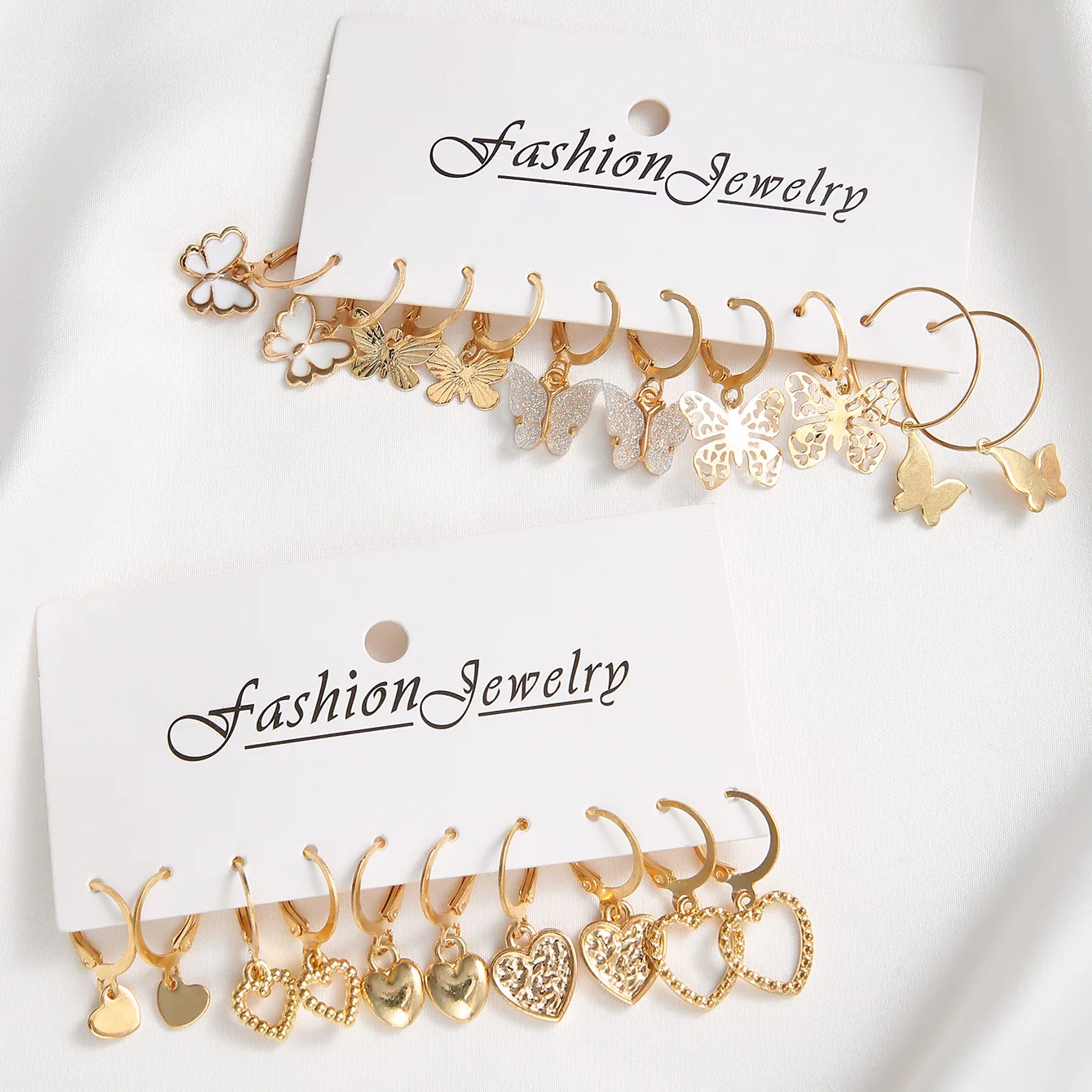 Nuevo conjunto de pendientes de aro de mariposa de Color dorado nuevo, pendientes colgantes huecos de corazón simples y creativos para mujer, joyería de moda