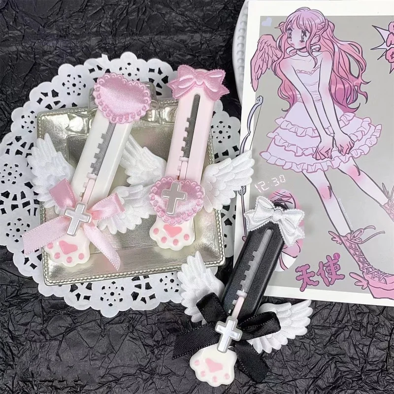 Niedliche Katze Pfote Utility Messer schöne Flügel Bowknot Stil offene Box Cutter Brief Umschlag Opener Mail Messer Schule Bürobedarf