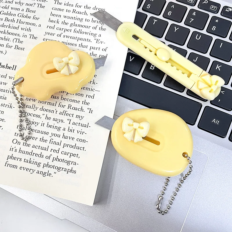 Mini couteau utilitaire d'art à nœud jaune mignon, couteau à papier, couteau rétractable pour déballage de paquets Express, papeterie cadeau