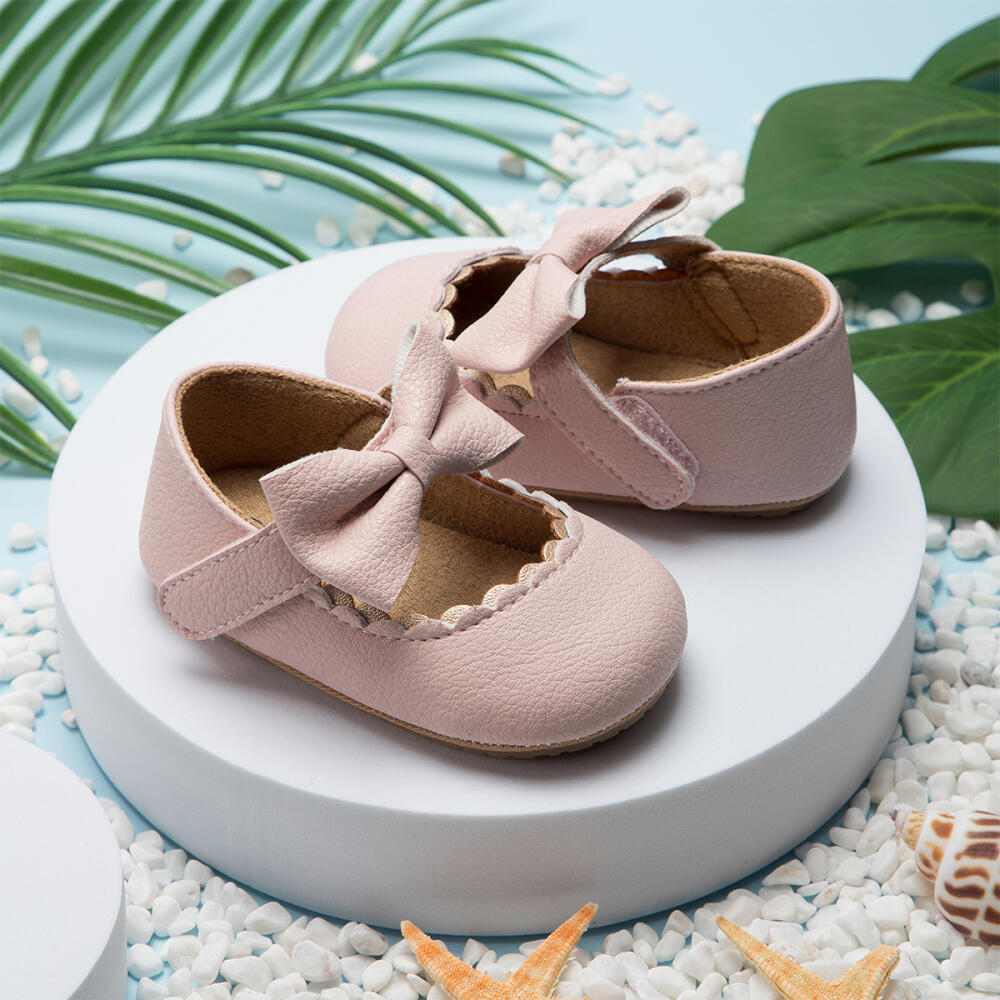 Retro nieuwe pasgeboren baby wandelschoenen lente herfst effen kleur strik prinses schoenen PU antislip zachte rubberen onderkant baby casual