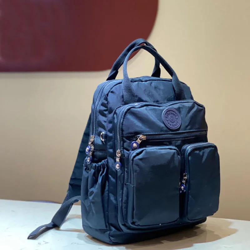 Mochila coreana informal clásica, mochila impermeable de alta calidad para mujer, mochilas de viaje, mochila escolar para niñas, mochila de Color sólido