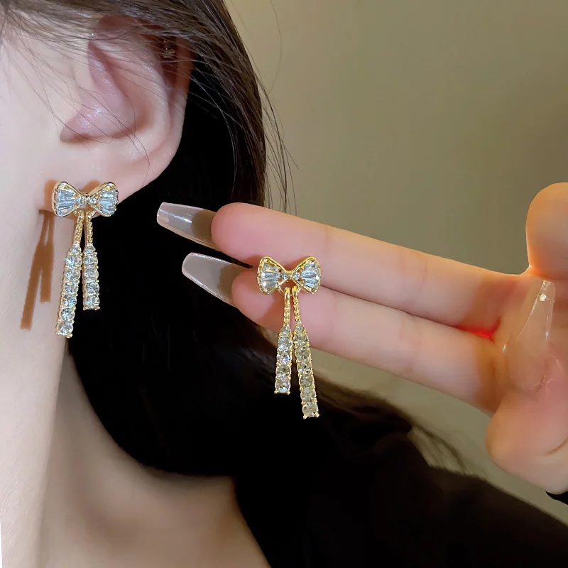 ทองสีเงา Bow STUD ต่างหูแฟชั่นผู้หญิง Dainty Rhinestone Bow Dangle ต่างหูเครื่องประดับของขวัญเพื่อน
