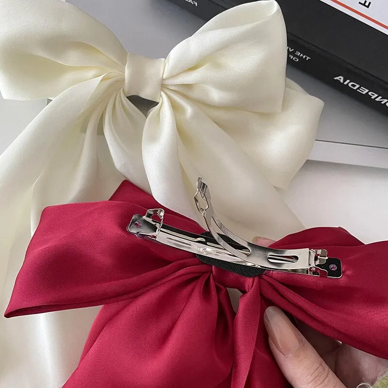 Fermaglio per capelli con nastro a fiocco da donna moda semplice Clip a molla in raso solido fermaglio per capelli elegante Clip per capelli retrò accessori per capelli per ragazze