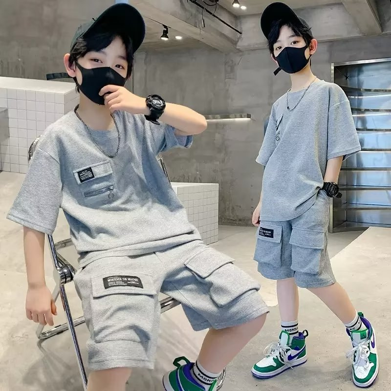 ใหม่ชุดชุดกีฬาเด็กผู้ชายชุด2ชิ้นเสื้อสูทแขนสั้นหลวม + กางเกงขาสั้นสำหรับฤดูร้อน