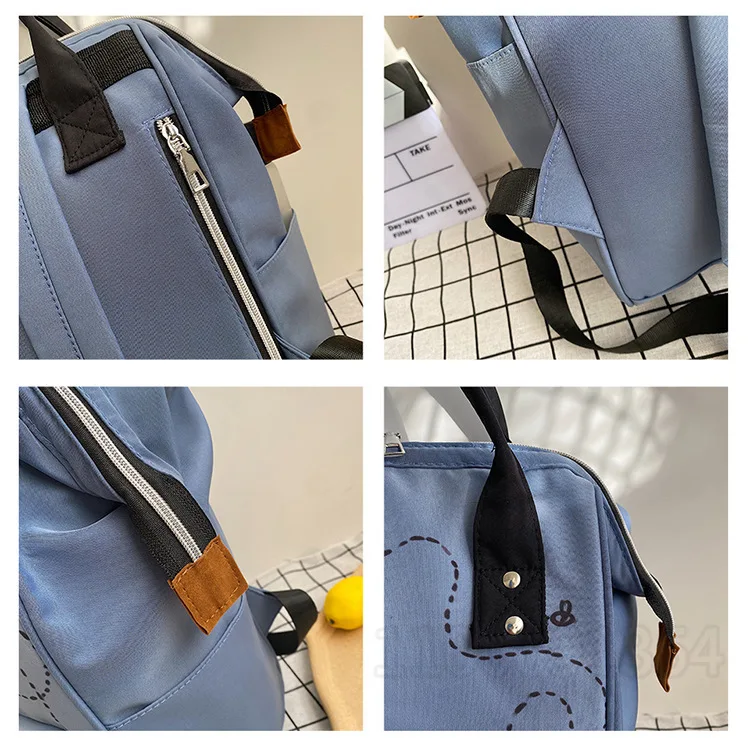 Disney winnie the pooh novo saco de fraldas mochila dos desenhos animados bonito mãe e bebê saco grande capacidade leve viagem mamãe saco