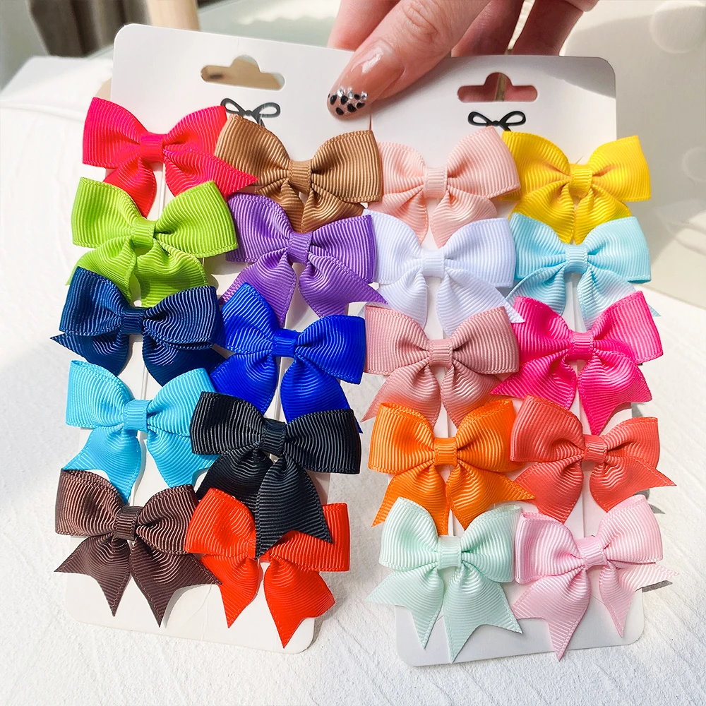 10 ピース/セット新かわいいソリッドリボンちょう結びヘアクリップ女の赤ちゃん手作り弓ヘアピンバレッタ帽子子供ヘアアクセサリー