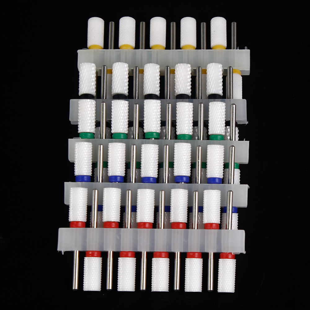 10 個セラミックネイルドリルビットセットフライスカッター電気マニキュアビット炎トウモロコシファイルペディキュアマシンポリッシュ Accesoires