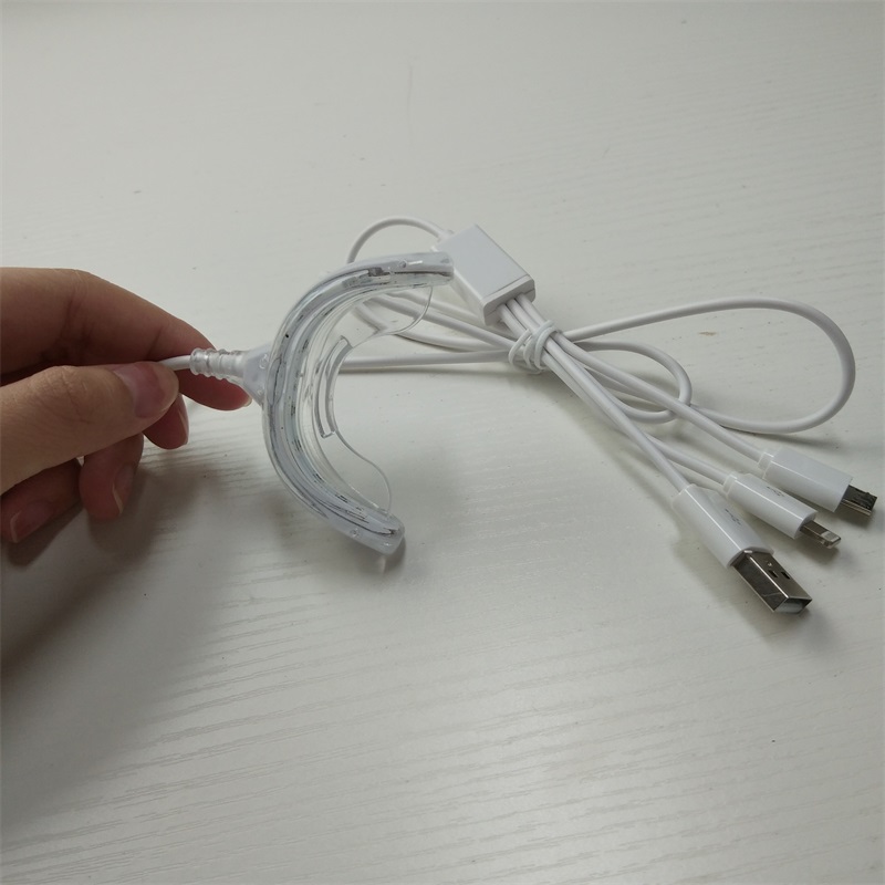 Terapia de luz roja para un alivio inmediatamente del dolor en los dientes, sensibilidad en las encías