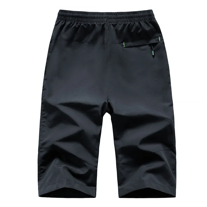 Pantalones cortos deportivos de secado rápido para hombre, pantalón informal de entrenamiento fino, a la moda, talla grande 7XL 8XL, verano, 3/4