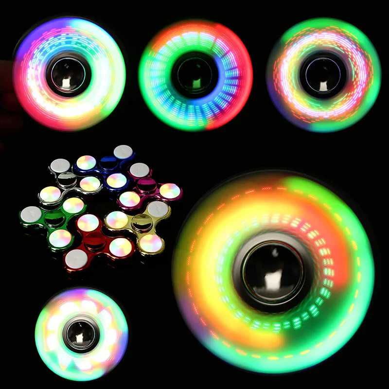 Lumière LED lumineuse créative Fidget Spinner main haut Spinners lueur dans la nuit lumière EDC Figet Spiner doigt soulagement du Stress jouets