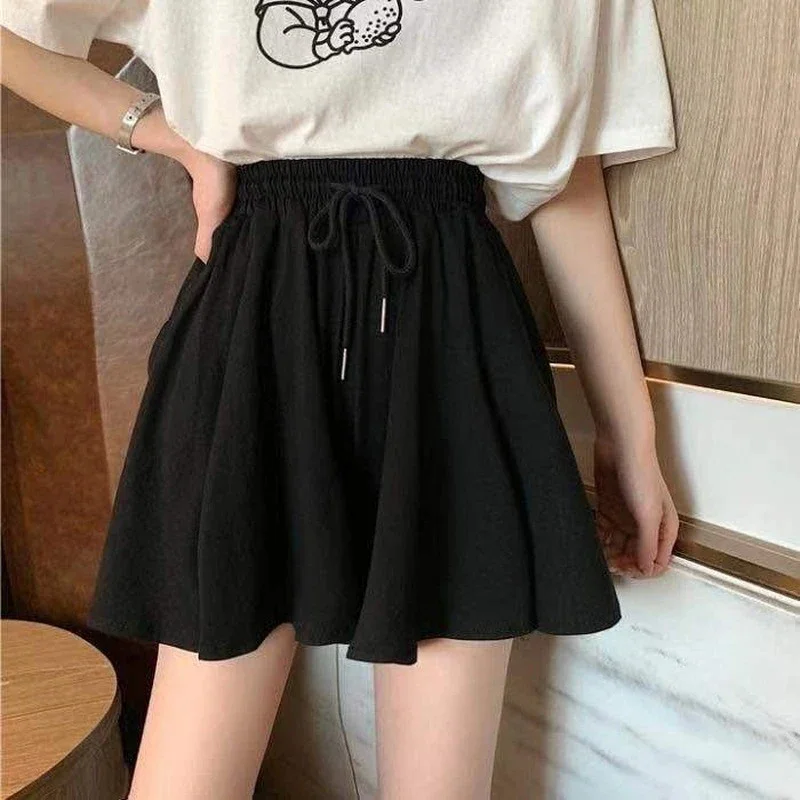 Faldas cortas de verano 5XL para mujer, pantalones cortos de pierna ancha informales elásticos de cintura alta, minifalda holgada de línea A coreana, pantalones cortos negros