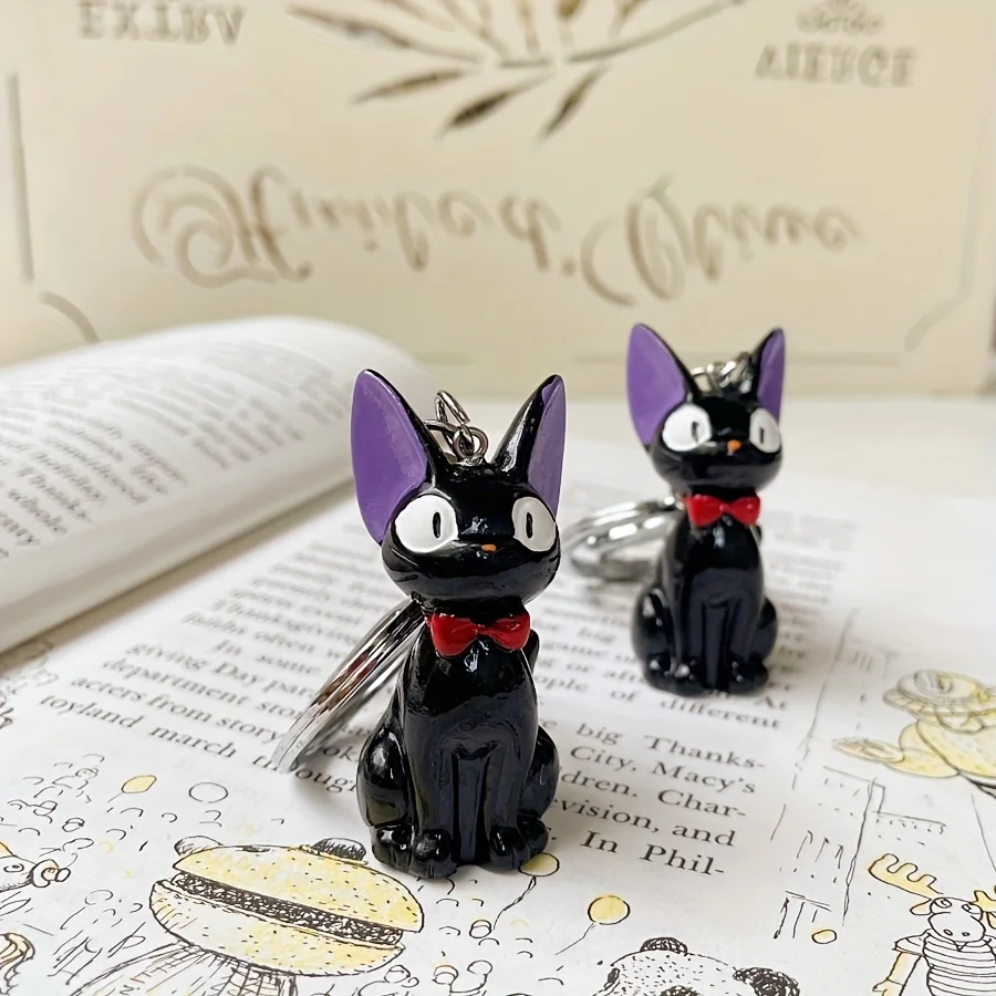 魅力的な黒猫キーホルダー - かわいいPVC製レディースファッションアクセサリー、バッグや鍵に最適、猫アクセサリー