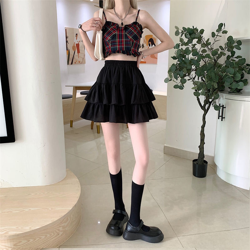 Falda plisada de línea a para mujer, falda blanca con volantes, estilo Preppy, elástica, cintura delgada, simple, venta al por mayor, Verano