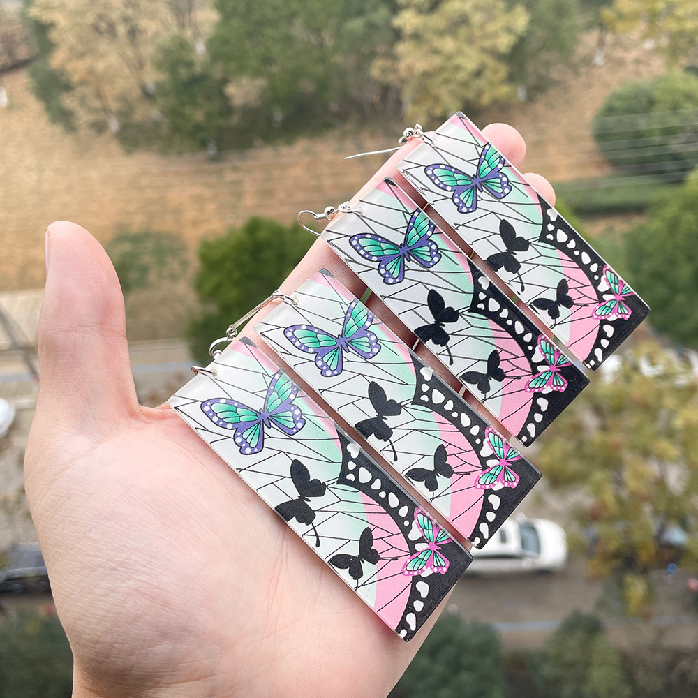 Anime demônio slayer brincos tanjiro sol e shinobu borboleta pingente brincos cosplay acessórios fã jóias presente