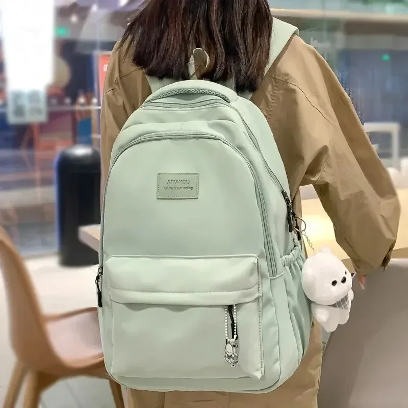 Mochila impermeable para adolescentes, mochila de nailon, mochila de moda para chica, bolso de hombro para mujer, mochila escolar negra para escuela secundaria