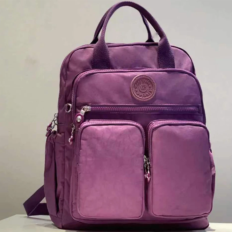 แฟชั่นผู้หญิงกระเป๋าเป้สะพายหลังไนลอนกันน้ํา Soft Handle Solid Multi-pocket Travel Zipper Feminina กระเป๋าแล็ปท็อปกระเป๋าเป้สะพายหลัง