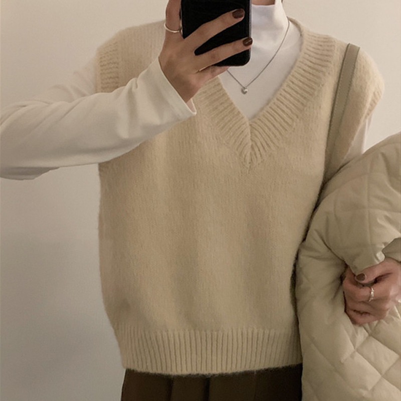 Mouwloze herfst winter trui gebreide dames truien vest nieuwe mode v-hals casual losse elegante gebreide kleding dieptepunt tops
