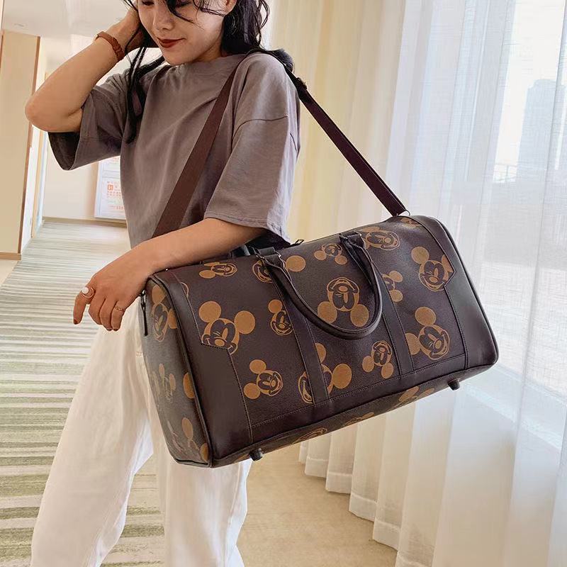 Disney mickey nova moda feminina bolsa de viagem bolsa de bagagem masculina e feminina grande capacidade bolsa mensageiro de um ombro