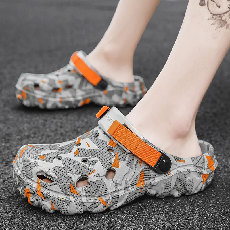 ผู้ชายใหม่ Clogs รองเท้าแตะรองเท้าแตะชายรองเท้าแบนรองเท้าแตะชายรองเท้าผ้าใบกลางแจ้ง Flip Flops บ้าน Clogs