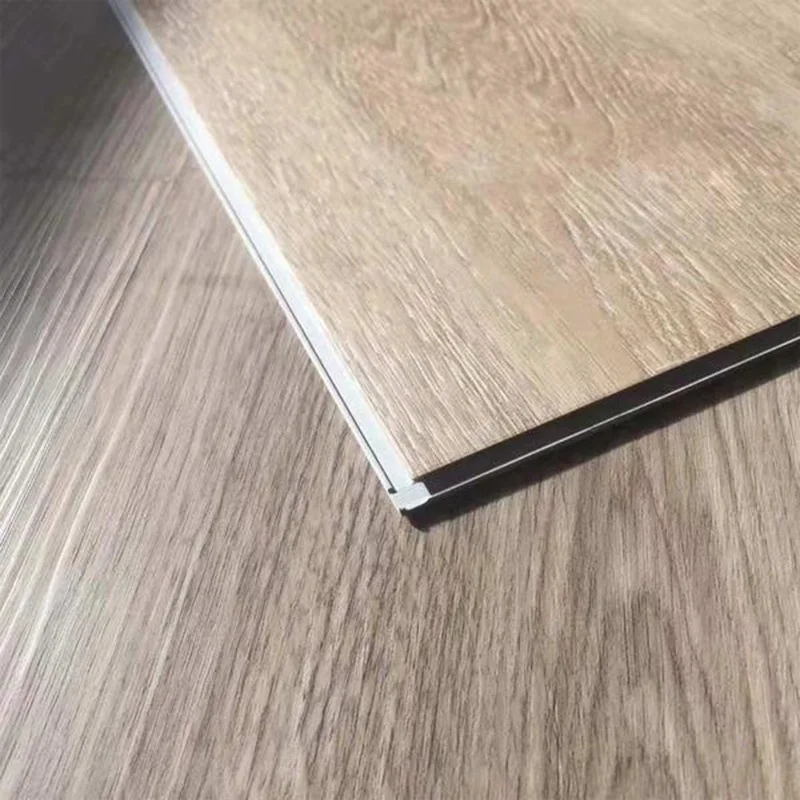 Piso de plástico flotante de revestimiento laminado entrelazado antideslizante impermeable, tablón de suelo de vinilo LVP de lujo, venta al por mayor, SPC