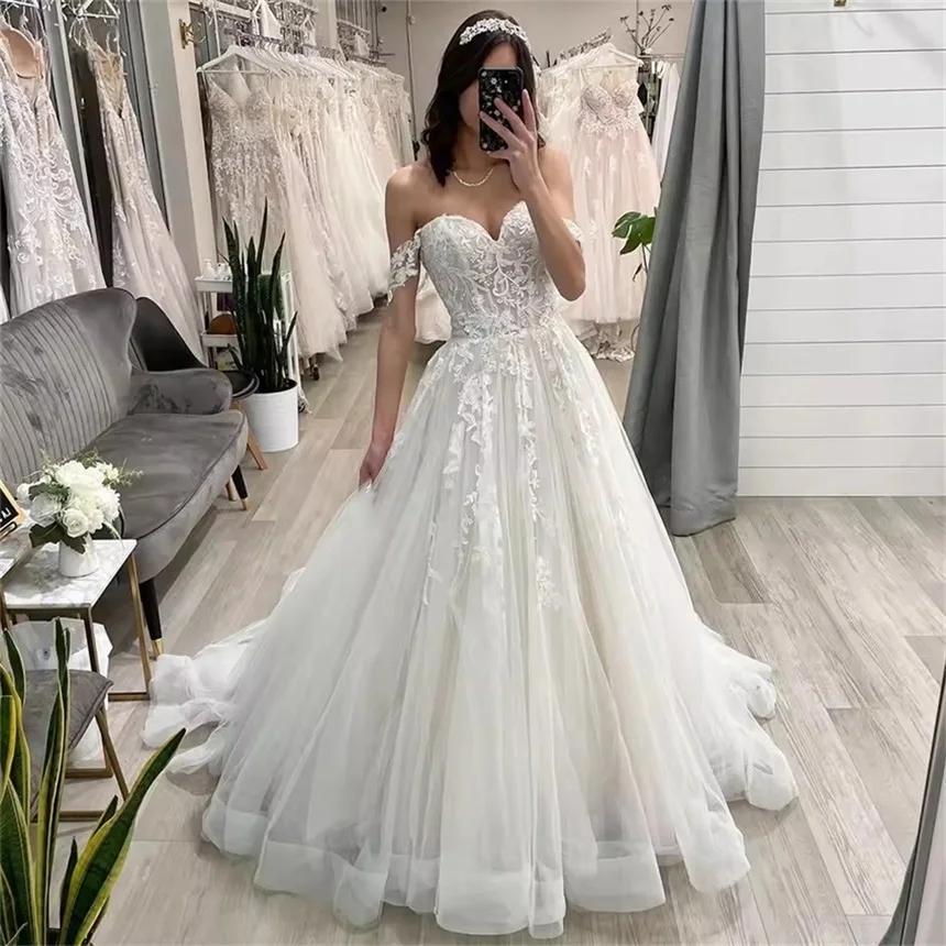 Abiti da sposa Boho eleganti personalizzati Applique in pizzo Abiti da sposa a-line Sweep Train Abito da sposa lungo gonfio abiti da sposa