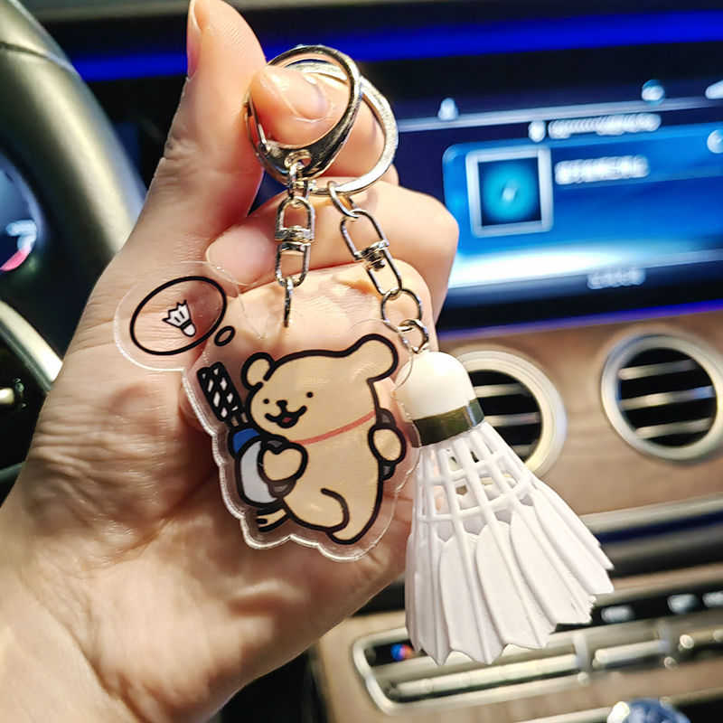 YONEX การ์ตูนกระเป๋าแบดมินตันพวงกุญแจแฟชั่นน่ารักไม้เทนนิสกระเป๋าเป้สะพายหลังพวงกุญแจอะคริลิคจี้คู่ของขวัญ