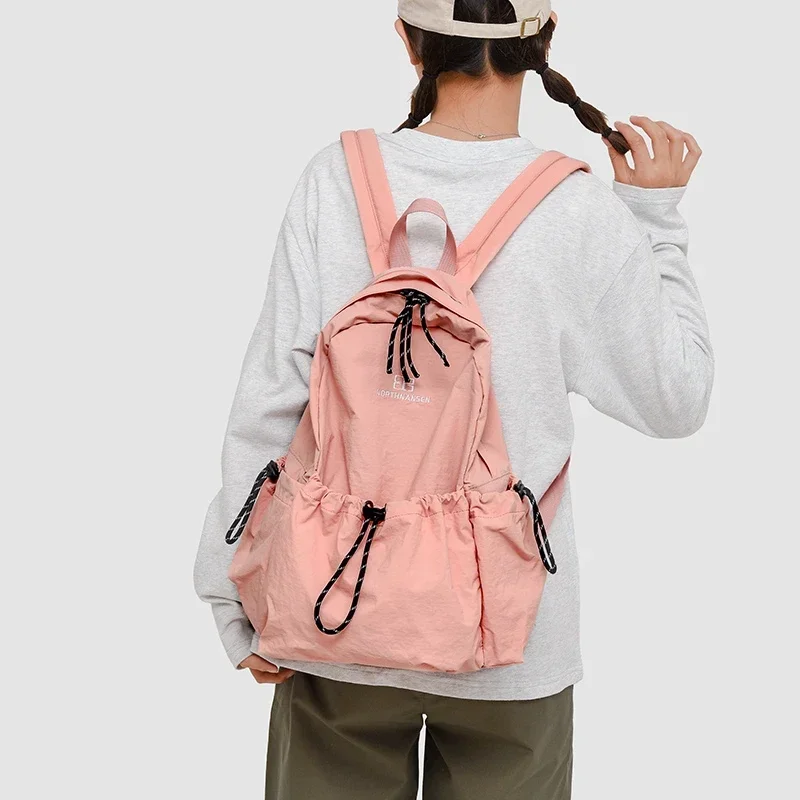Solid Nylon Large Capacity Backpack 2025 Hot Selling Air Cushion Strap Soft Casual Backpack Soft Handle Outer Frame School Bags