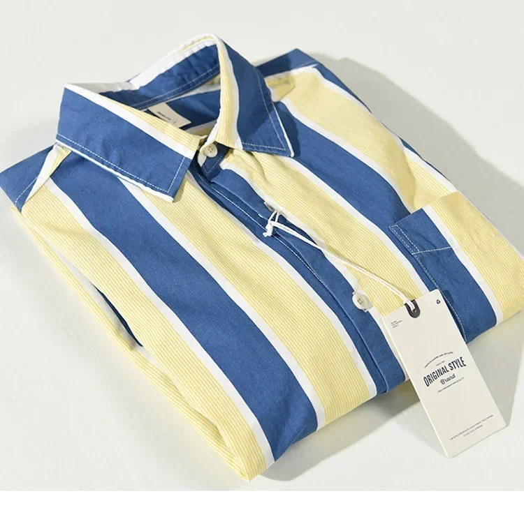 เสื้อผ้าผู้ชายใหม่2023ฤดูใบไม้ร่วงฤดูหนาวเสื้อลำลองทรงหลวมมีกระเป๋าเสื้อแฟชั่นผ้าฝ้ายลายทางสีน้ำเงินและเหลืองใส่สบาย