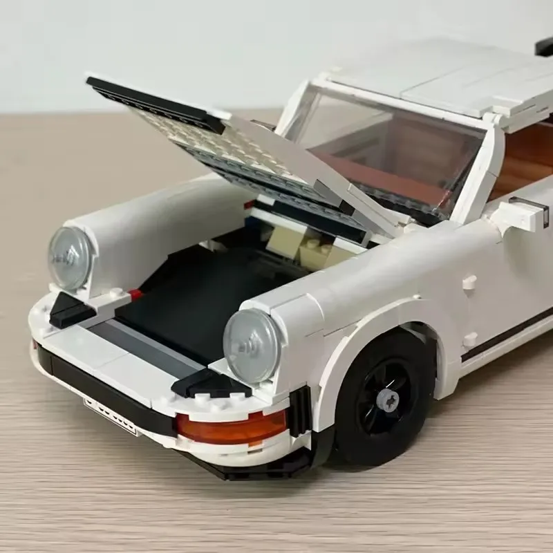 ของเล่นร้อนการวิเคราะห์ Retro รถรุ่น Legoing 10295 Building Blocks ชุด Race Classic ชุดสําหรับผู้ใหญ่และวัยรุ่นของเล่นของขวัญ 1458PCS