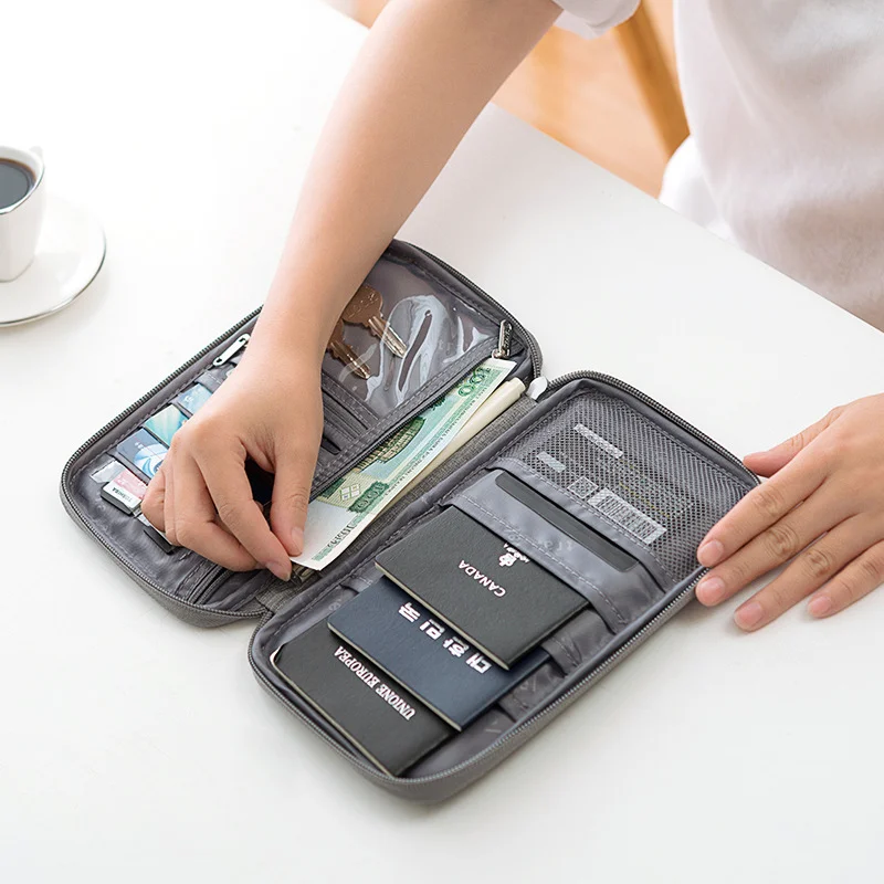 Organizador de documentos de viagem - Porta-passaporte à prova d'água com bloqueio RFID, slots para vários cartões e bolso com zíper para avião/trem