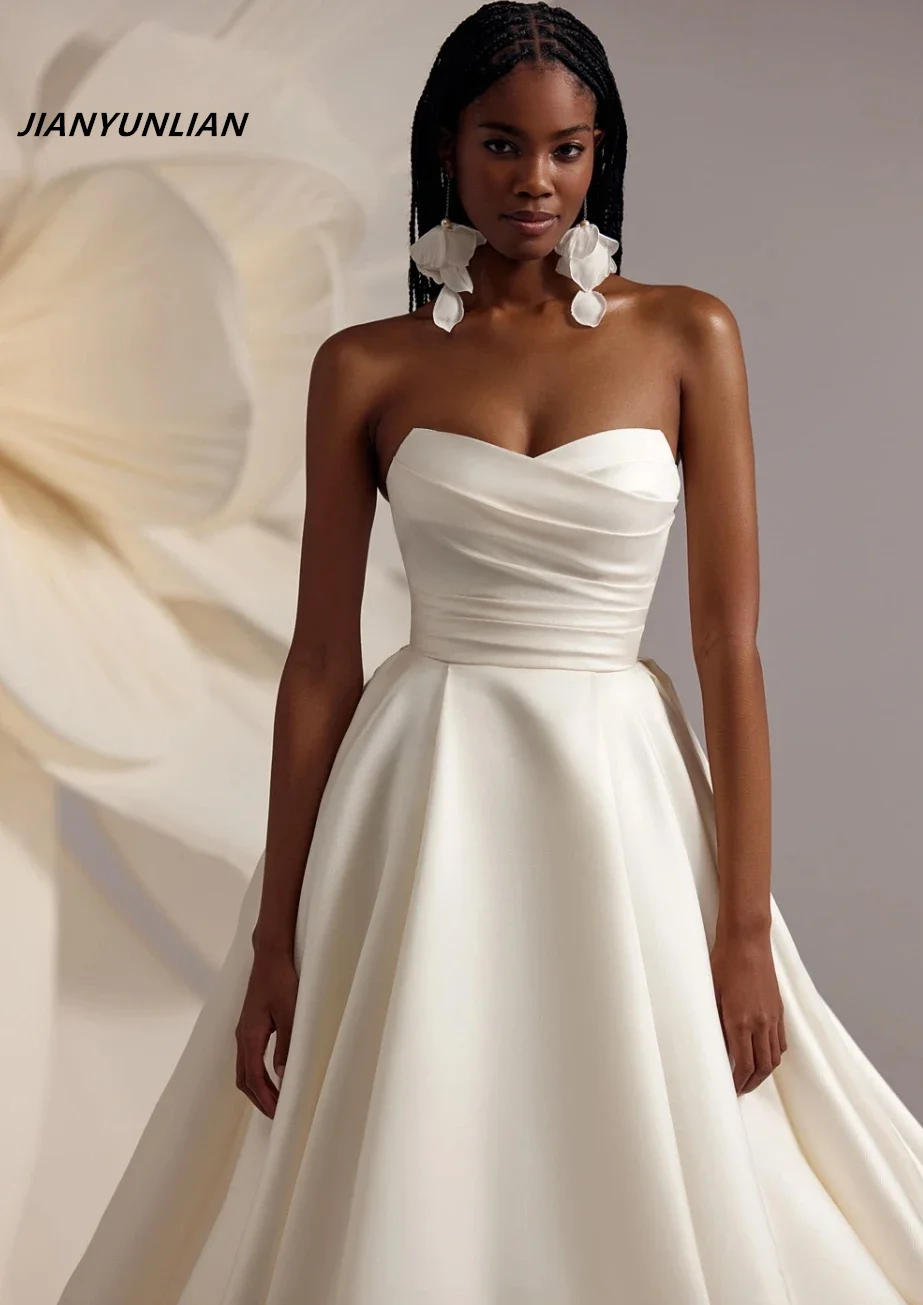 Abiti da sposa personalizzati Lunghezza pavimento Sweetheart A-Line Coda lunga Backless per le donne Misura abiti da sposa affascinanti