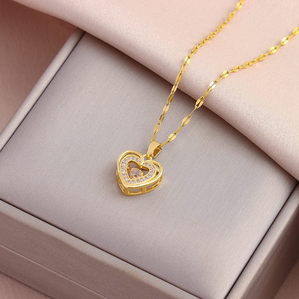 Nuevo en collares con colgante de la serie de corazón batiente dulce y Sexy para mujer, joyería de cadena de clavícula de acero inoxidable a la moda de lujo para mujer