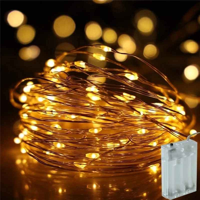 สายไฟ LED ทองแดงลวด 3XAA แบตเตอรี่ดําเนินการคริสต์มาสงานแต่งงานตกแต่ง 2M 5M 10M 100LED String ไฟ Fairy
