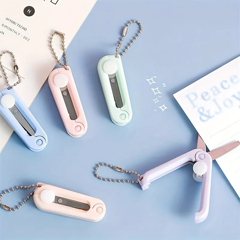กรรไกรพับได้ขนาดเล็กพกพาสะดวก 1 ชิ้น สีพาสเทล สร้างสรรค์ ทำจากสแตนเลส สำหรับตัดกระดาษ งานศิลปะ อุปกรณ์สำนักงานและโรงเรียน