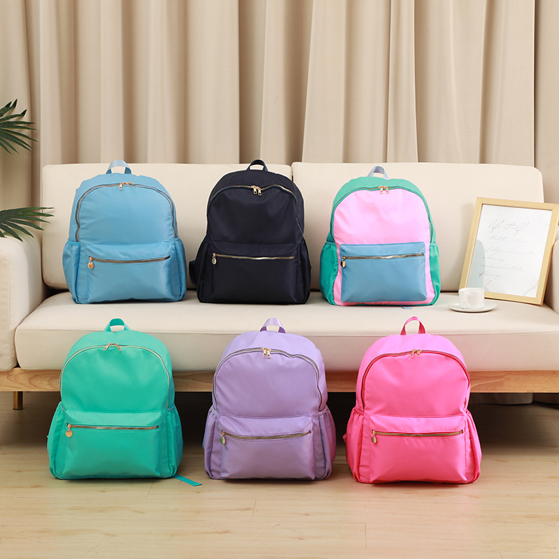 Mochila escolar sólida de nailon para mujeres y niñas, ligera, impermeable, clásica, para estudiantes, bolsa de viaje grande, informal, sencilla