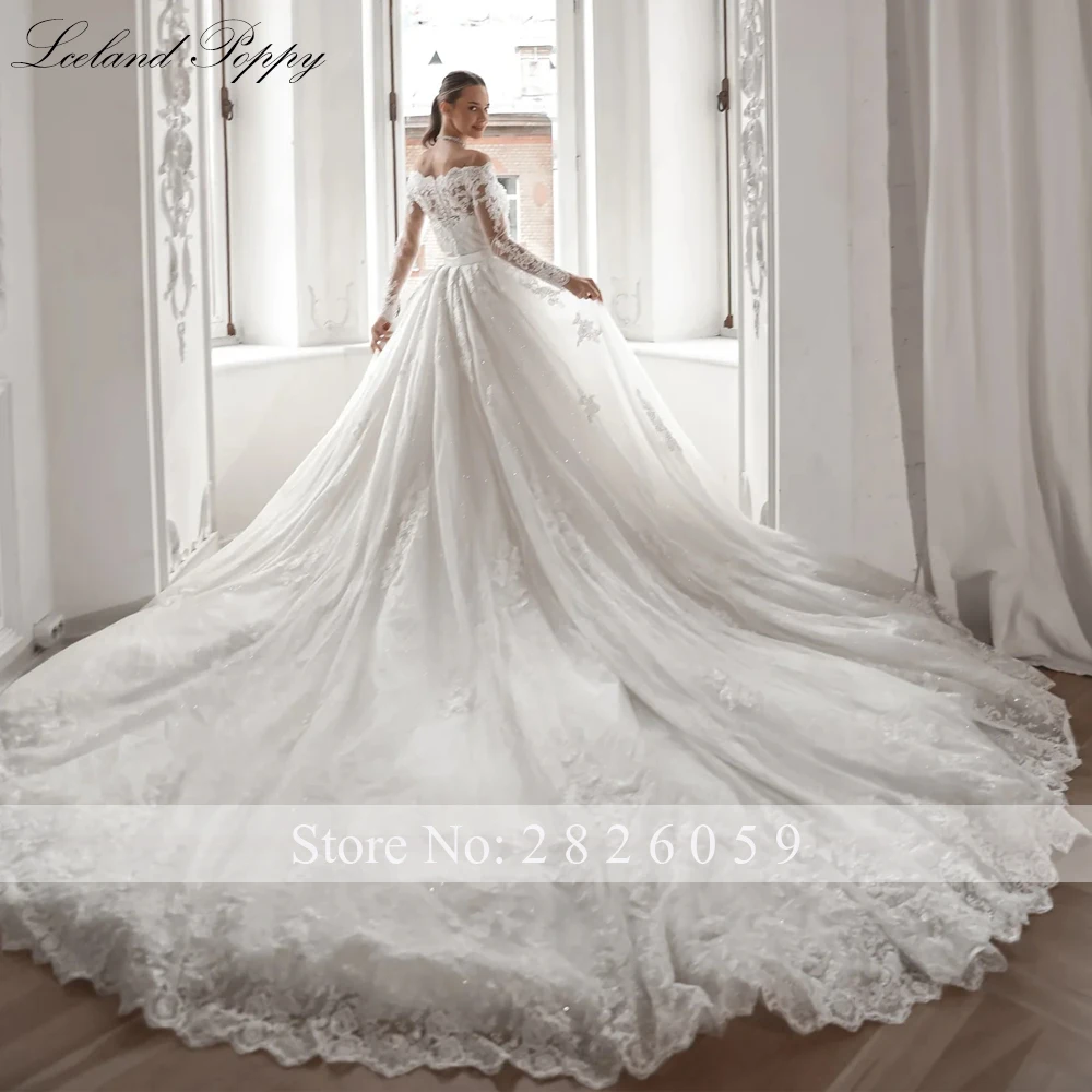 Lceland Poppy Abiti da sposa personalizzati in pizzo a sirena con scollo a barca Applicazioni di perline Abiti da sposa a maniche lunghe con strascico staccabile