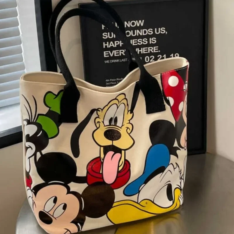 Bolso de lona versátil de gran capacidad con dibujos de Mickey para mujer, bolso de mano informal y versátil, bolso de clase para estudiantes
