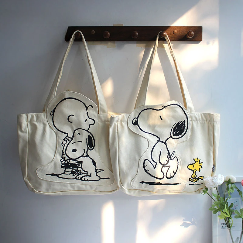 Nuova borsa a tracolla in tela Snoopy moda cartone animato Borsa a tracolla per lezione studentessa carina casual di grande capacità