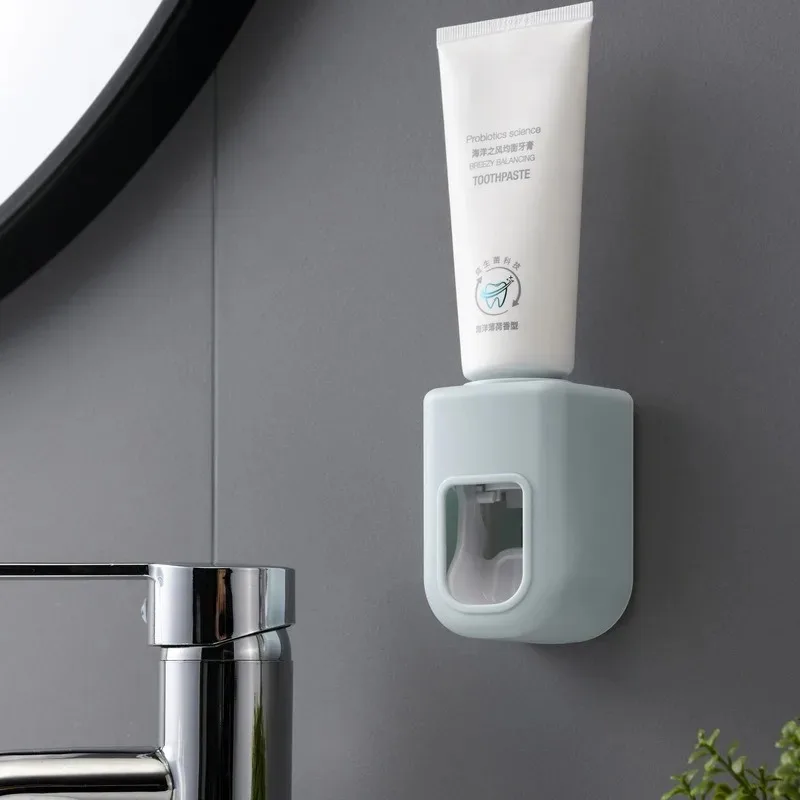 Creative Wall Mount เครื่องจ่ายยาสีฟันอัตโนมัติอุปกรณ์ห้องน้ํากันน้ําขี้เกียจยาสีฟัน Squeezer ผู้ถือแปรงสีฟัน