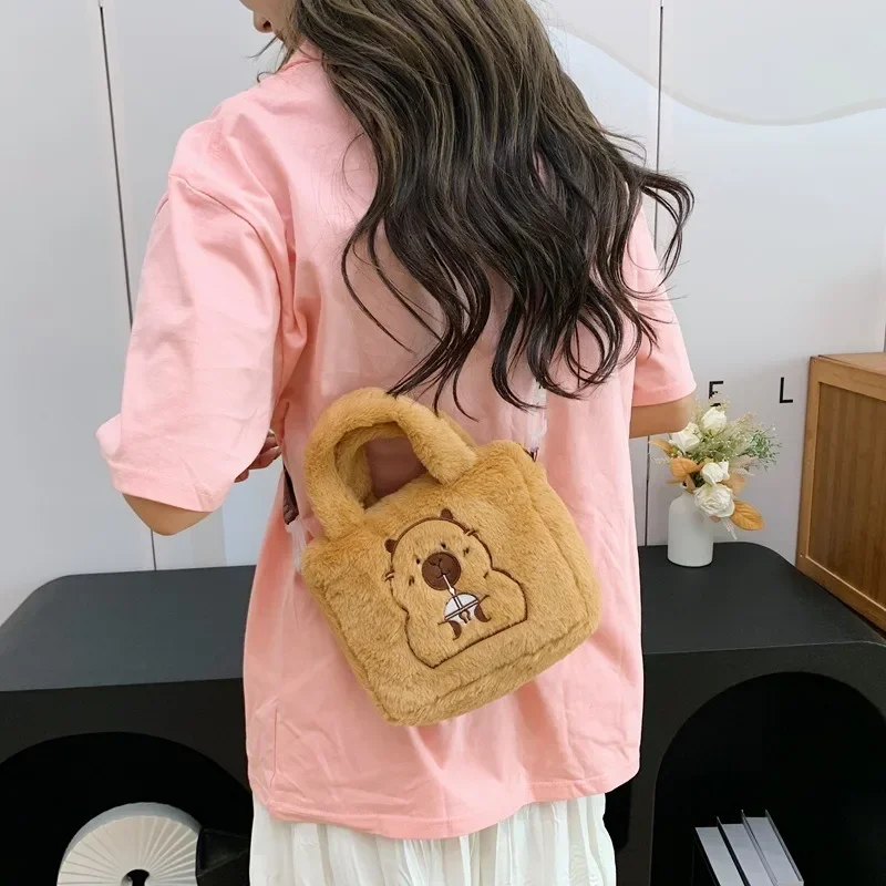 การ์ตูนตุ๊กตากระเป๋าถือCrossbodyอะนิเมะผลิตภัณฑ์น่ารักKapybaraตุ๊กตาPlushกระเป๋าเด็กCrossbodyกระเป๋าเหรียญ