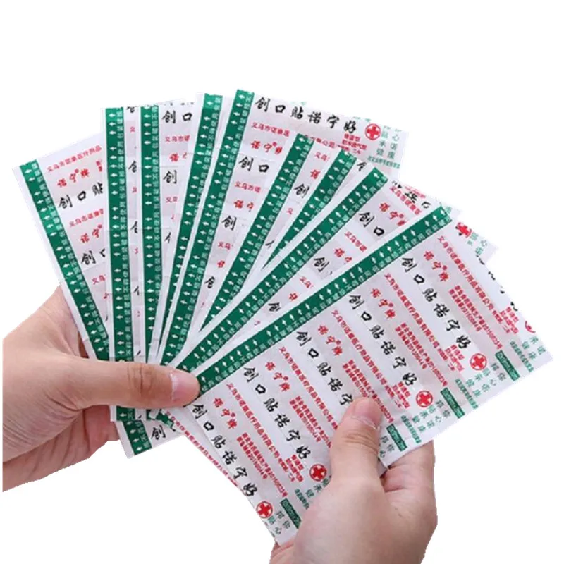 50pcs กันน้ํา First Aid Woundplast Breathable ผ้าพันแผลกาวทางการแพทย์เทปผ่าตัดบาดแผล Band Aid Sticking Plaster