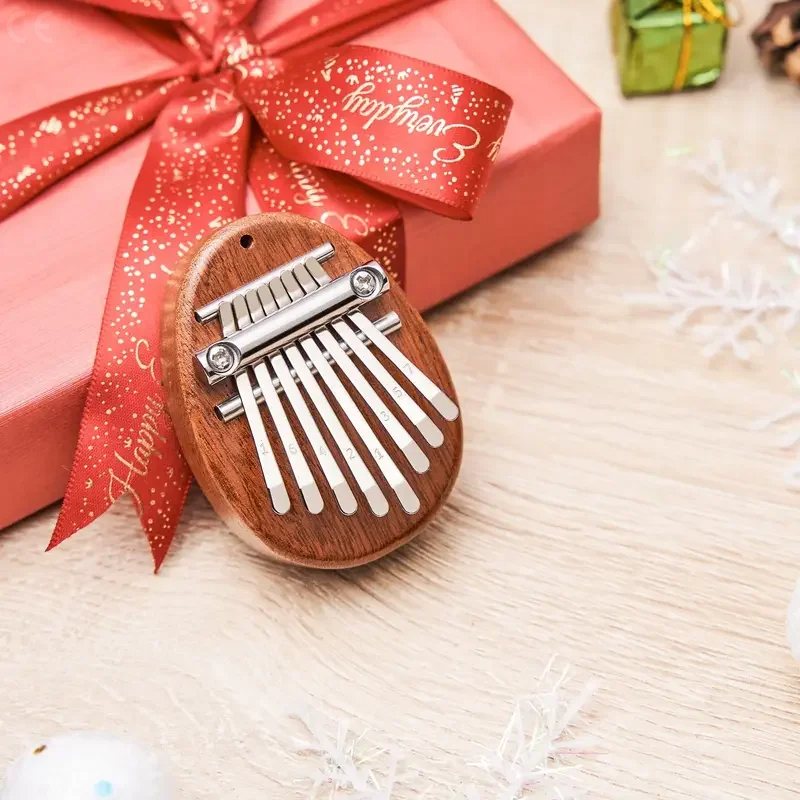 MINI Kalimba 8 Key Thumb เปียโน 1 Pack Water DROP สไตล์น่ารักแบบพกพาชุดของขวัญสําหรับเด็ก