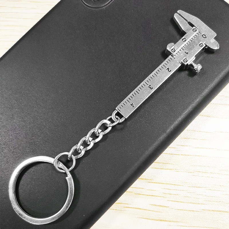 1 nova moda chave do carro mini vernier caliper portátil 0-40mm chaveiro ferramenta de medição chaveiro do carro anel pinça