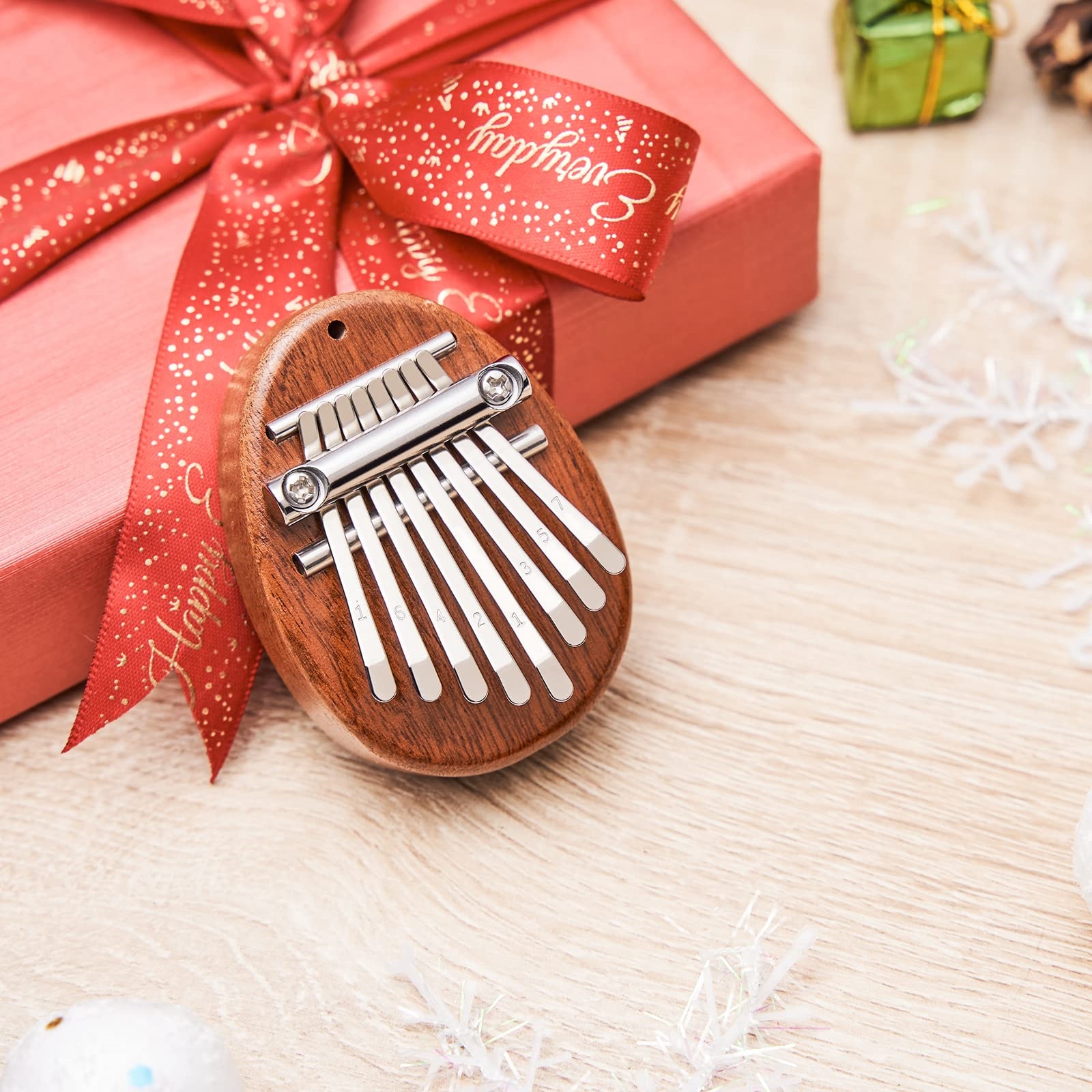 Mini Kalimba Daumenklavier mit 8 Tasten, 1 Packung, Wassertropfen-Stil, niedliches Instrument, tragbar, exquisites Geschenkset für Kinder