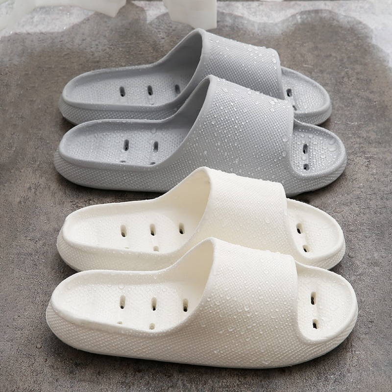 Quick-drying cheap women's slippers Non-slip soft-sole bathroom slippers hollowed out leaky slippers Casual couple home slippers