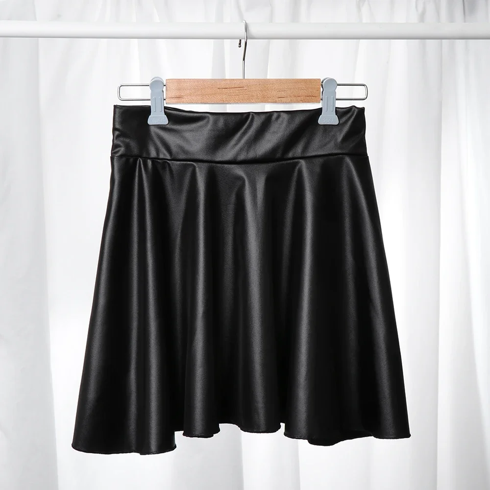 Mezza gonna strutturata in ecopelle a vita alta per le donne Gonna a trapezio versatile e basic Gonna a ombrello Minigonna sexy e sottile