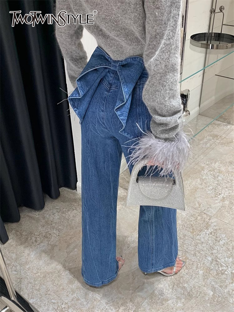 Calças jeans das mulheres de Twotwinstyle, patchwork, cintura alta, botão emendado, perna larga, cor sólida