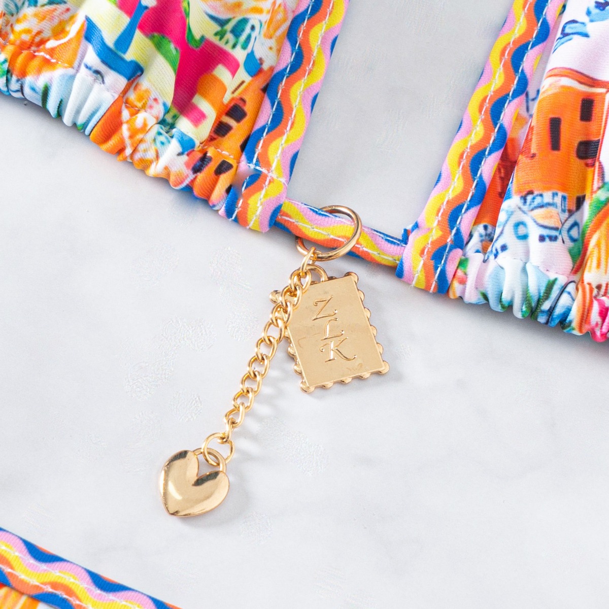 „2025 Neues Triangel-Bikini-Set – Push-Up-Badeanzug mit Blumendruck und brasilianische Hose“