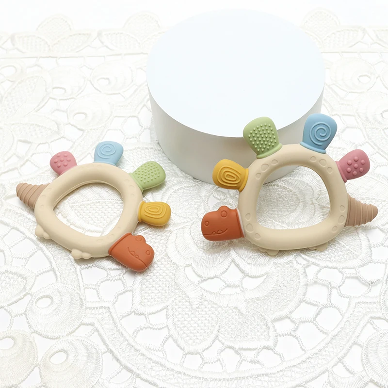 เด็กไดโนเสาร์ซิลิโคนTeethingของเล่นBPAฟรีง่ายต่อการจับทารกCare Teether Chewingของเล่นสําหรับทารกแรกเกิดของขวัญทารกอุปกรณ์เสริม